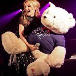 Kylie minogue with a giant teddy bear