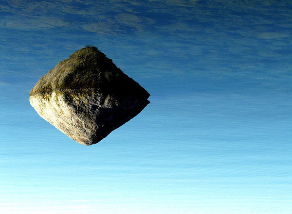 floating rock reflection illusion