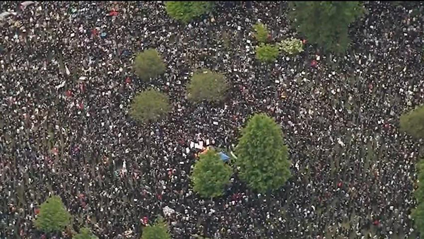 This optical illusion is actually an aerial shot of BLM protests in Boston in 2020.