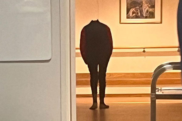 A headless figure