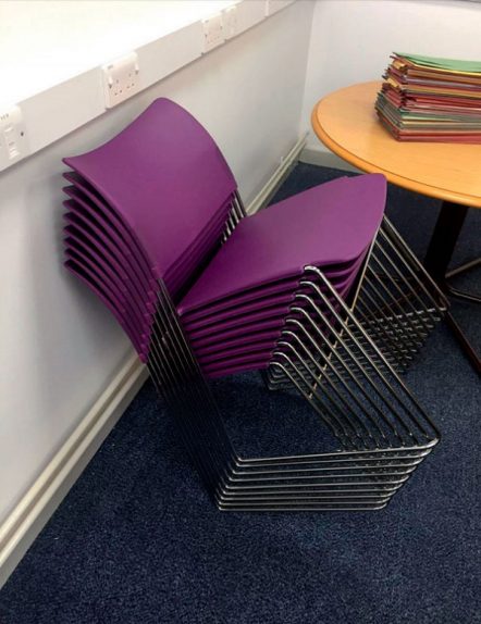 Impossible stack of chairs