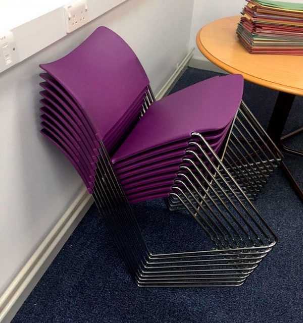 Impossible stack of chairs