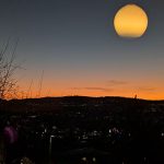 Giant moon reflection optical illusion