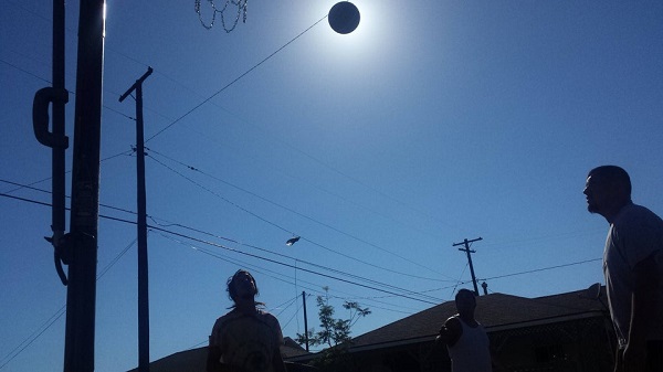 The sun eclipsed by a basketball