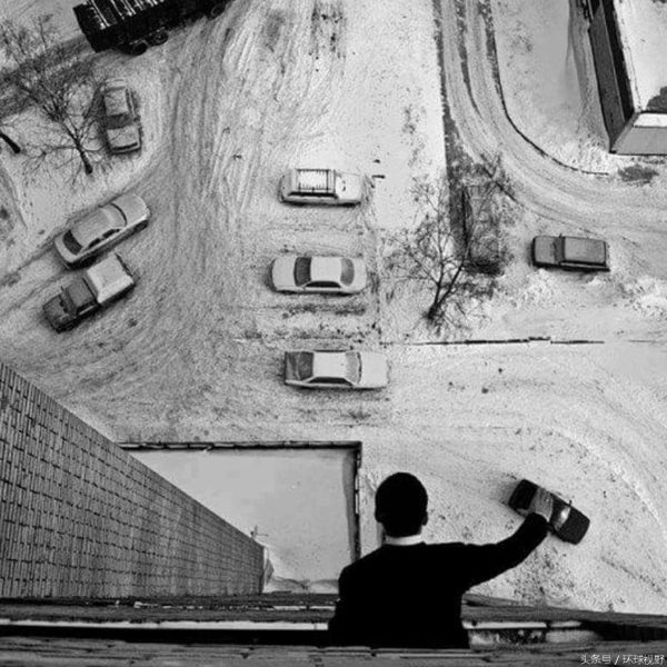 Man playing with toy cars