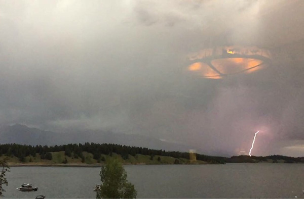 Photo of a UFO in a storm with lightning in the background.